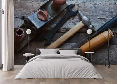 old tools on wooden background Wall mural