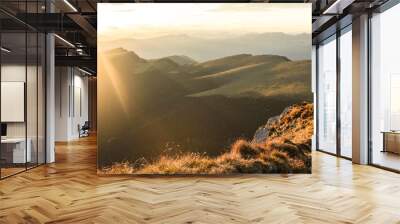 Silhouette of the man on top the peak of mountain on sunrise sky , Sport and active life conceptual design. Wall mural