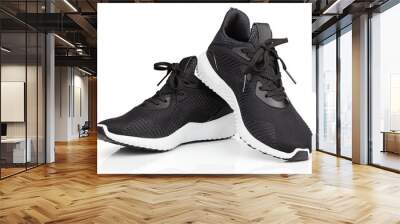 Pair of new unbranded black sport running shoes or sneakers isolated on white background with clipping path Wall mural