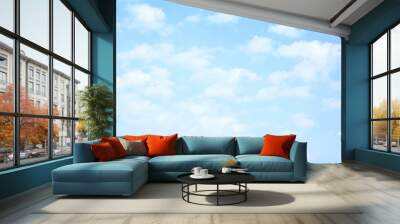 Light blue sky with clouds Wall mural