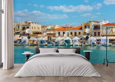 Port and waterfront with small houses in Aegina town Wall mural