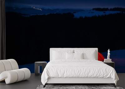 tent at night in winter mountains Wall mural