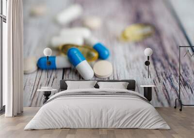 Vitamin capsules, nutritional supplements and vitamins. Wall mural