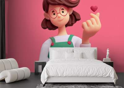 Portrait of smiling positive casual brunette girl in glasses wearing green apron, white t-shirt makes korean love sign, finger heart gesture. I Love You. Minimal art style. 3d render on pink backdrop. Wall mural