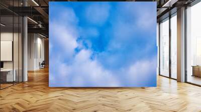 Light fluffy clouds high in the blue sky. Wall mural