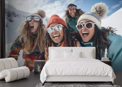 a group of young cheerful diverse men and women posing for a selfie photo on the ski or snowboard vacation in the mountains, having much fun in the snowy terrain Wall mural