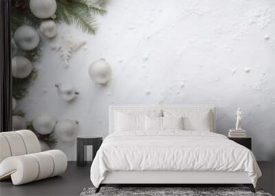 a top vie flat lay christmas background border with copy space in the middle: white surface, golden and silver christmas tree ornaments , evergreen branches Wall mural