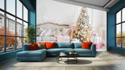 New Year's holiday or celebration, the mood, Stylish Christmas minimalistic interior, Presents and wrapped gifts under the Christmas tree. large white living room with a vintage sofa Wall mural