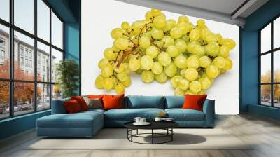 Juicy big bunch of green grapes on white background. View top. Winemaking. Production fruit juices.. Wall mural