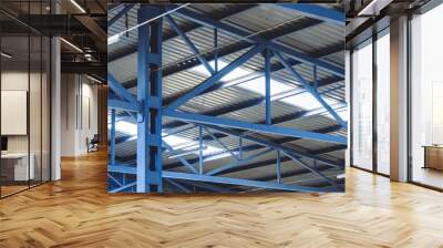 Metal trusses of ceiling of an industrial shop Wall mural