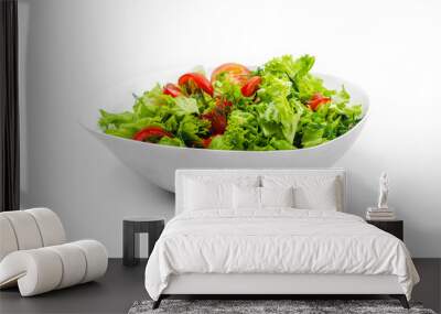 side view of white bowl with vegetables isolated on white background. green salad, dill, tomato. Wall mural