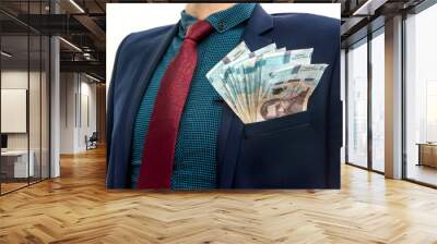  man in a suit with a huge pile of Ukrainian money. 1000 hryvnia. UAH. Wall mural