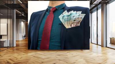  man in a suit with a huge pile of Ukrainian money. 1000 hryvnia. UAH. Wall mural