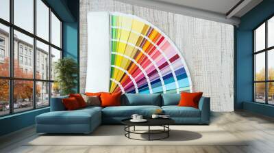 catalog in bright color palette close-up on desk Wall mural