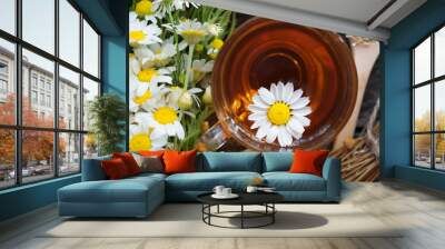 cup of herbal chamomile tea and daisy flowers. doctor treatment and prevention of immune concept, medicine - folk, alternative, complementary, traditional medicine  Wall mural