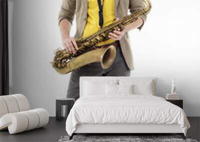 saxophone player in yellow t-shirt and bowtie . guy playing the Wall mural