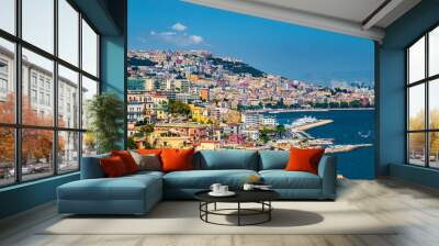 Naples bay scenic view, Italy. Travel background picture with blue sea and cityscape in golden light of evening. Wall mural