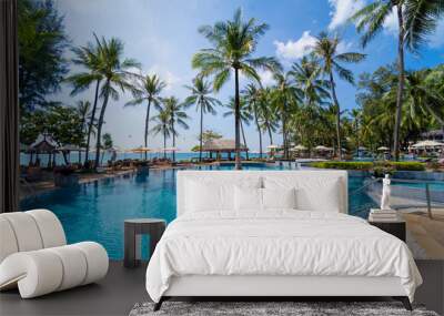 Amazing tropical paradise beach with swimming pools and coconut palms Wall mural