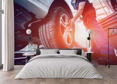 Automotive suspension test and brake test rolls in a auto repair service. Wall mural