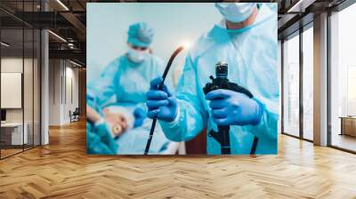 Endoscopy at the hospital. Doctor holding endoscope before gastroscopy Wall mural