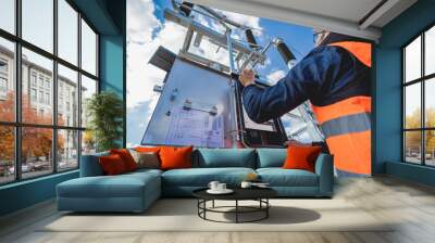 Engineer electrician check the substation construction process Wall mural