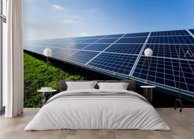 Photovoltaic solar panels on blue sky background Wall mural