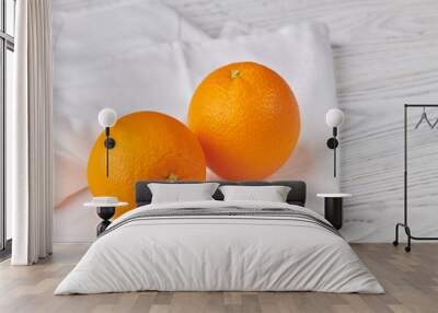 two oranges on a white wooden background Wall mural