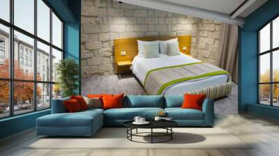 Comfortable room in a modern hotel with an urban style. Stylish and environmentally friendly apartment. Wall mural