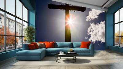 Concept cross religion symbol silhouette over sky. Christian religion background concept. The cross symbol for Jesus Christ. Wall mural