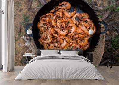 crispy fresh shrimp cooked on a frying pan in the wild. Rest in nature with fresh food
 Wall mural