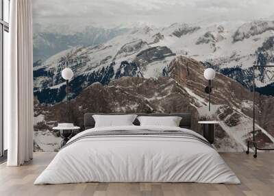 Snow covered swiss alps from above view of mountain Saentis Wall mural