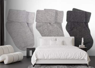 three pairs of gray socks for baby isolated on white Wall mural