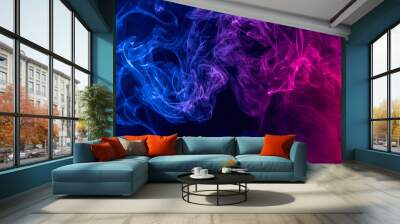 Conceptual image of colorful red and blue color smoke on dark black background. Wall mural