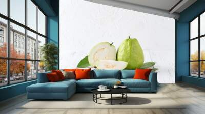 Delicious guava fruit set on white wooden table background with copy space. Wall mural