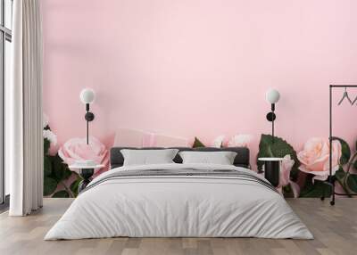 Valentine's Day and Mother's Day design concept background with pink flower and gift on pink background. Wall mural