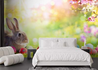 Adorable Bunny With Easter Eggs In Flowery Meadow Wall mural