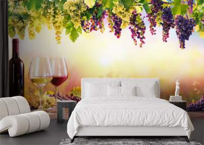 Bottles And Wineglasses With Grapes At Sunset
 Wall mural