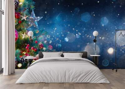 Christmas Tree With Baubles In Blue Night - Ornaments On Fir Branches With Glittering And Defocused Lights In Abstract Background Wall mural