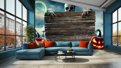 Halloween Card Party - Pumpkins And Zombies In Graveyard With Wooden Board Wall mural