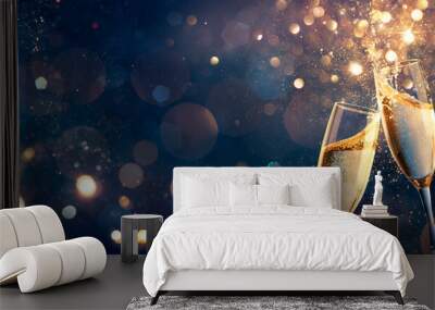 Happy New Year - Champagne Toast Celebration - Goblets With Golden Glittering On Blue Abstract Background With Defocused Bokeh Lights Wall mural