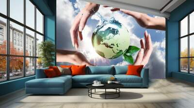 recycled elements in the hands Wall mural