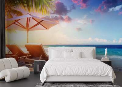 Two Deckchairs Under Parasol In Tropical Beach At Sunset
 Wall mural