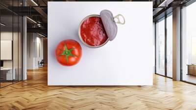 Tin of chopped canned tomatoes with whole fresh tomatoes, isolated on white background, soft light Wall mural