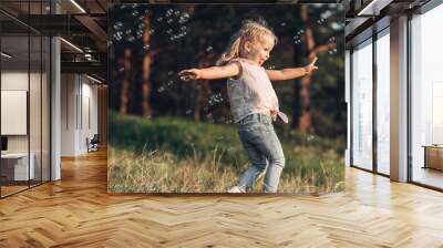 Portrait of Happy Little Girl Having Fun in the Park Wall mural