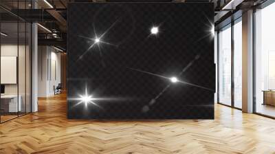 Flash light on black background. Vector glow sparkle effect. Abstract lens flare ignition. Flashing lights Wall mural