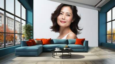 Japanese 30-40 years old woman with smooth healthy face skin. Skincare commercial portrait. Chinese, Korean asian woman touch face. Beauty and cosmetics skincare advertising concept. Wall mural