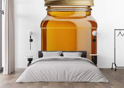 Golden honey in a glass jar with a metal lid isolated on a white background. Wall mural