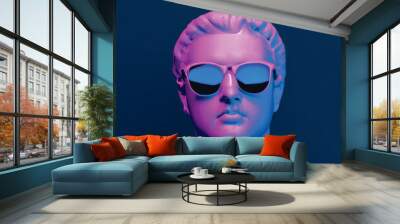 studio photographic portrait of a Minimal scene of sunglasses on human head sculpture Wall mural