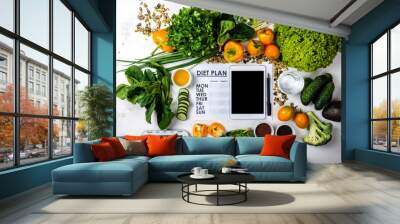 Tablet computer Diet plan and set of healthy food with kitchen scale Wall mural