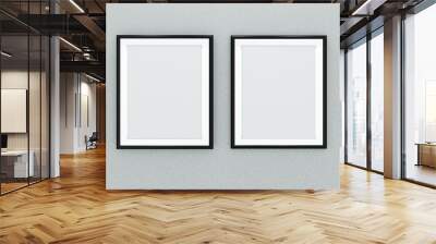 Two black picture frames over light grey wall Wall mural